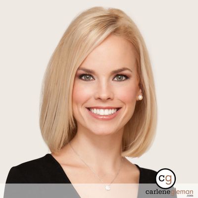 Professional business headshot of a woman with blonde hair