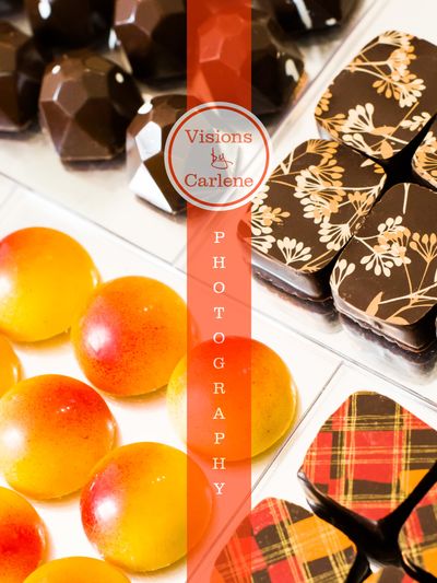 Artisan chocolate assortment including bonbons and decorated chocolate squares